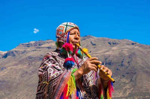 peruvian-man-playing-a-flute-sacred-valley-cusco-perujpg